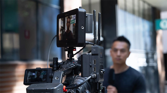 Atomos TX-RX director monitoring wirelessly on set, or a broadcaster monitoring multiple camera angles